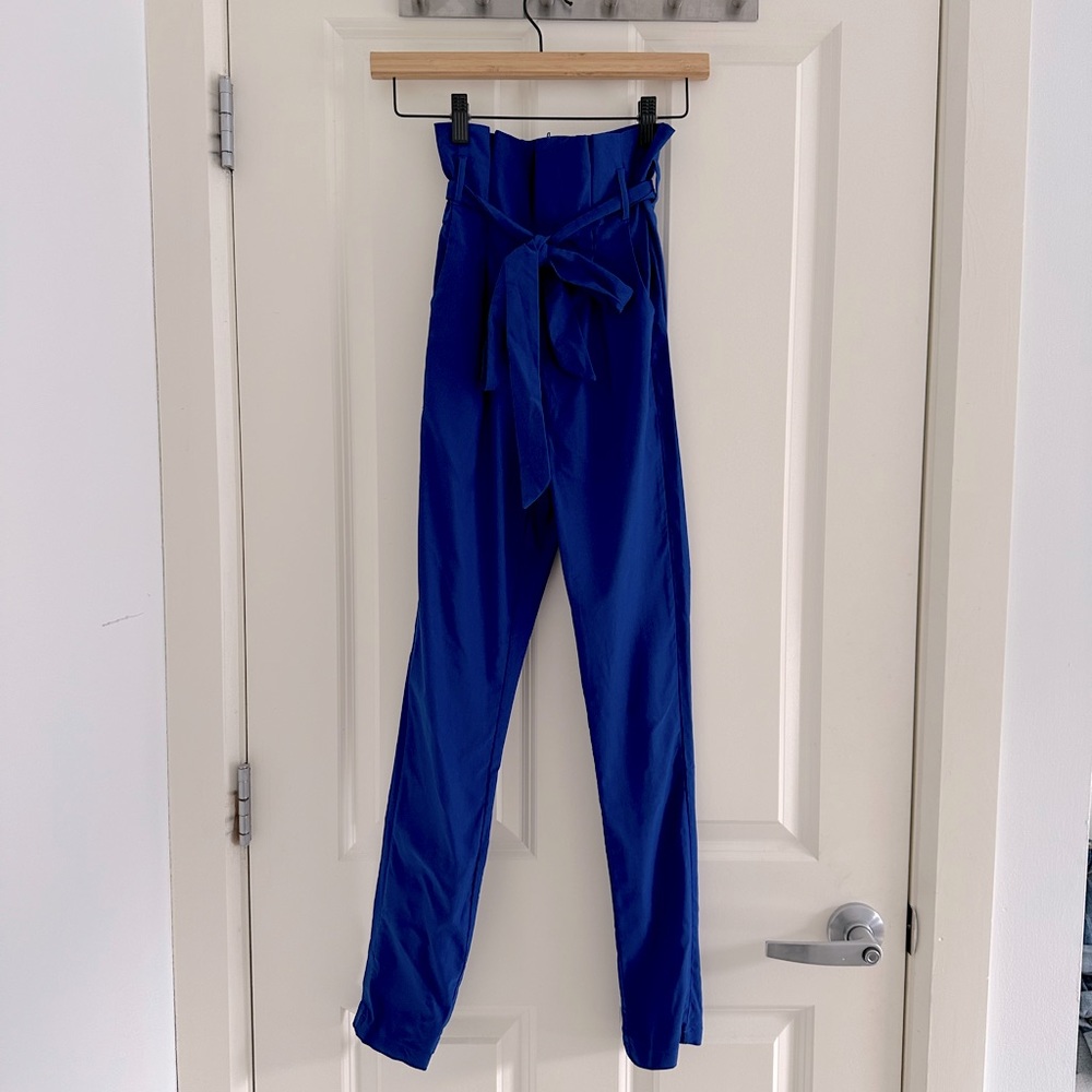 Love Moda bright blue skinny pants high-rise with bow. Size S.